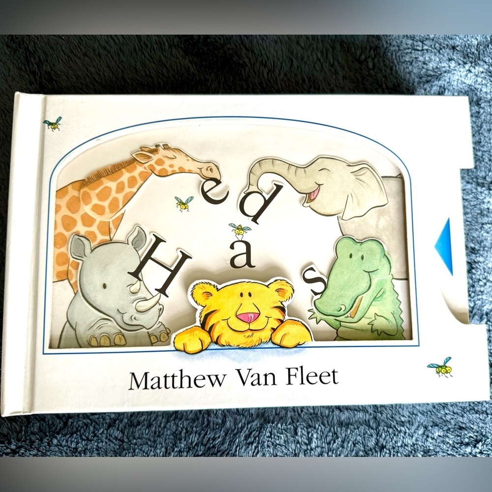Mathew Van Fleet book with moving parts in fair used condition, has ripped pages